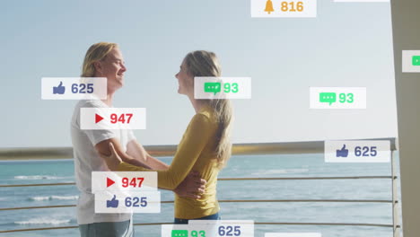 notificaciones de las redes sociales animación sobre pareja abrazándose por el océano