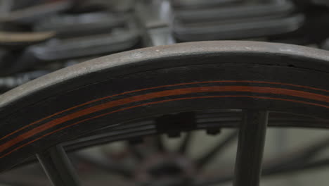 close up of pinstripes on old carriage wheel