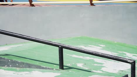 Skateboarder-doing-trick-and-crossing-in-front-of-camera