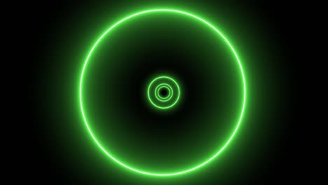 vuelo a través de un túnel futurista con círculos de luz de neón verde.