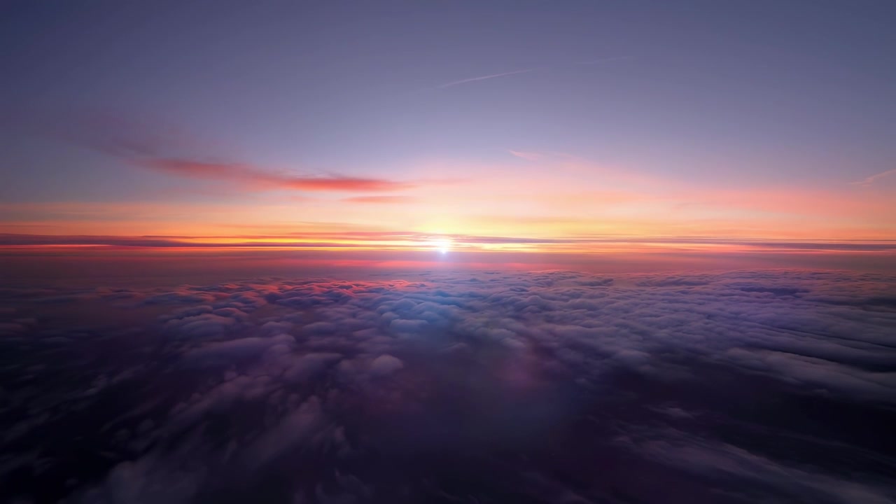 Vista aerea di un tramonto vibrante sopra nuvole soffici