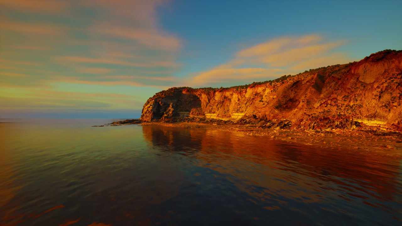 Enchanting cliffside landscape with shimmering sea and spectacular sky