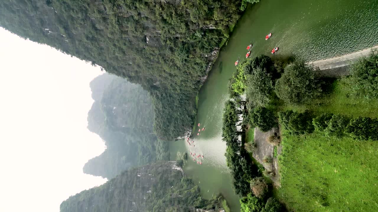 Vertical drone clip of Trang A Landscape Complex in Vietnam, a popular Unesco site for tourists.