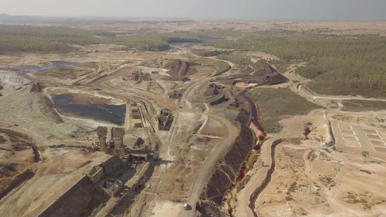 The São Domingos Mine by drone, a deserted open-pit mine in Corte do Pinto, Alentejo, Portugal