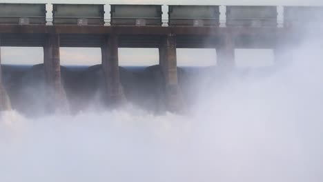 Sluice-Gates-at-dam-wall-expelling-water,-close-up,-Vaaldam-South-Africa