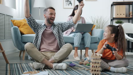 family playing games together at home