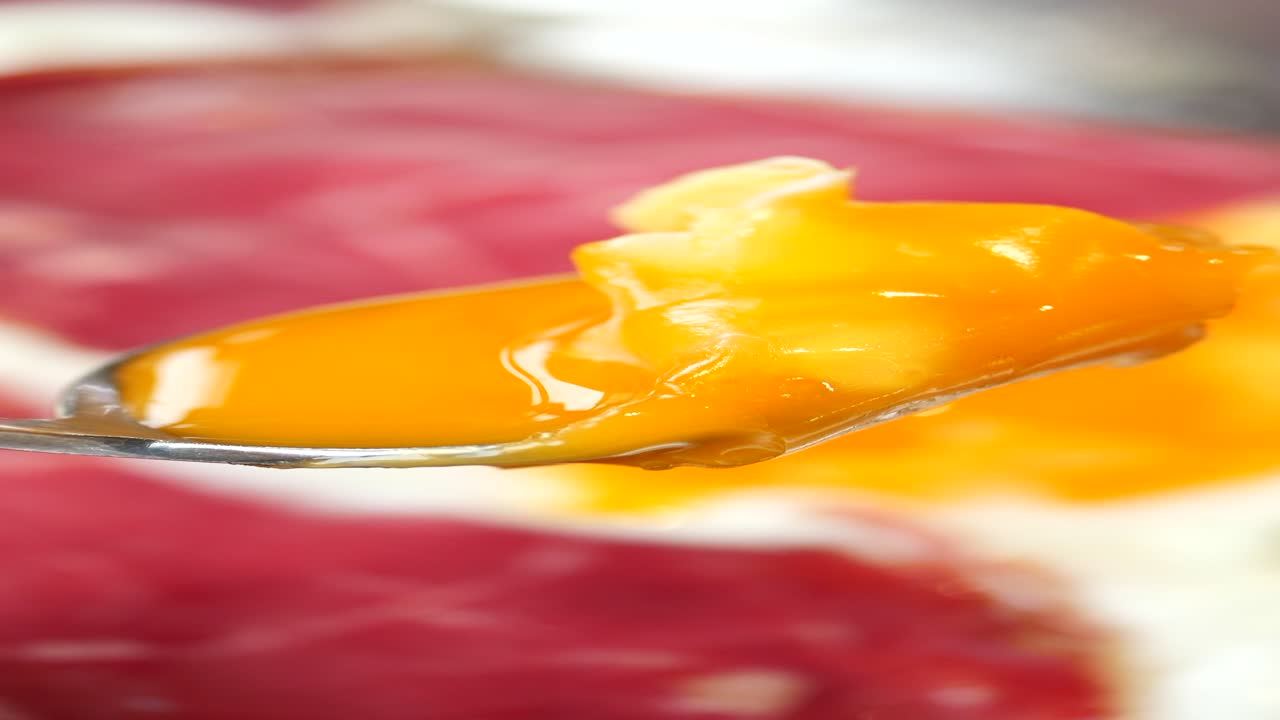 Spoonful of Egg Yolk on Breakfast