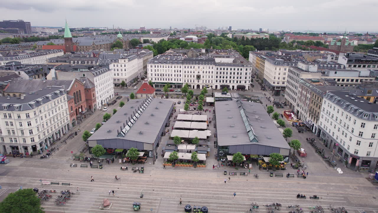 Torvehallerne is nestled amidst the lively cityscape, close to N&oslash;rreport in downtown Copenhagen