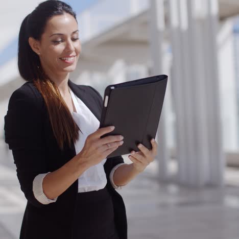 smiling woman surfing the internet