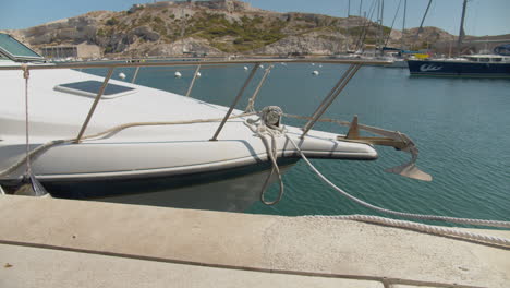 Close-up-static-shot-of-luxury-sail-boats-moored-in-the-French-port-of-Frioul-on-the-Mediterranean