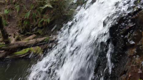 Dickerson-Creek-Waterfall-at-Ueland-Tree-Farm-near-Bremerton-Washington-on-the-Olympic-Peninsula,-moss-covered-rocks,-cascading-water