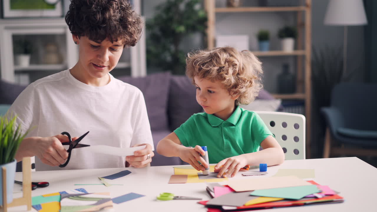 Mother and child doing arts and crafts at home