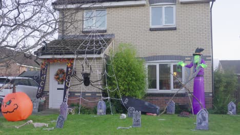 typical detached uk residential house decorated, halloween celebrations