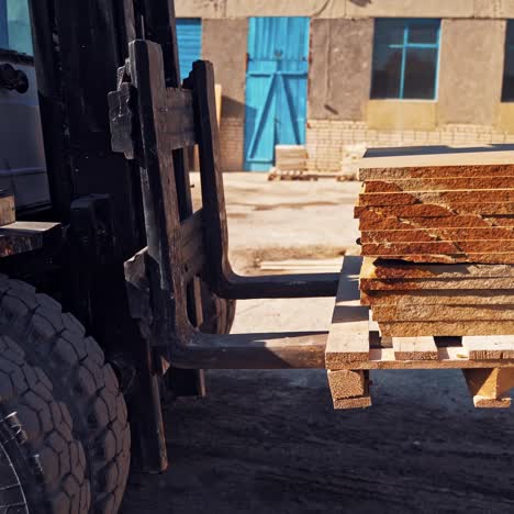 loader holding marble block
