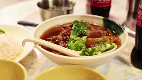 delicious beef noodle soup served with rice