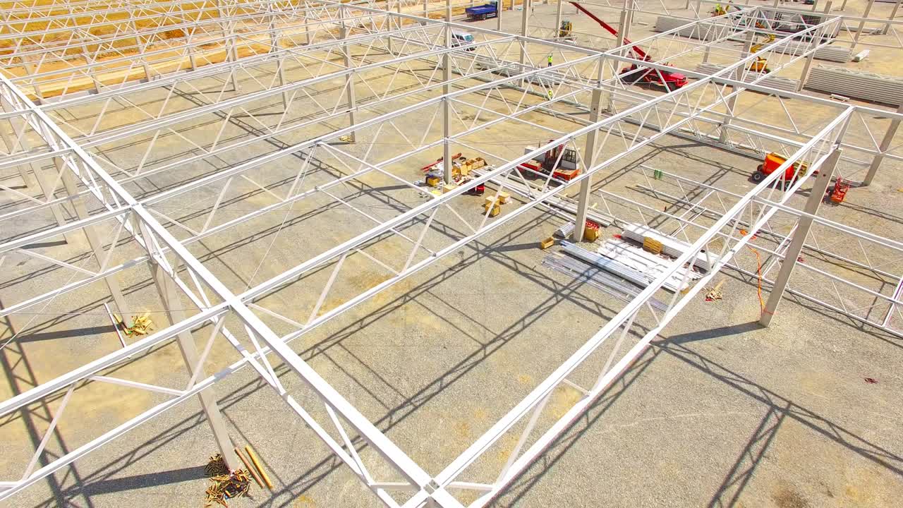 Aerial view of construction site. Industrial theme from drone. Industry, development and investment in European Union.