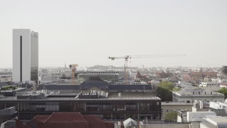 SLOW-MOTION:-Tilt-up-to-the-cityscape-of-Berlin-with-landmark-tower