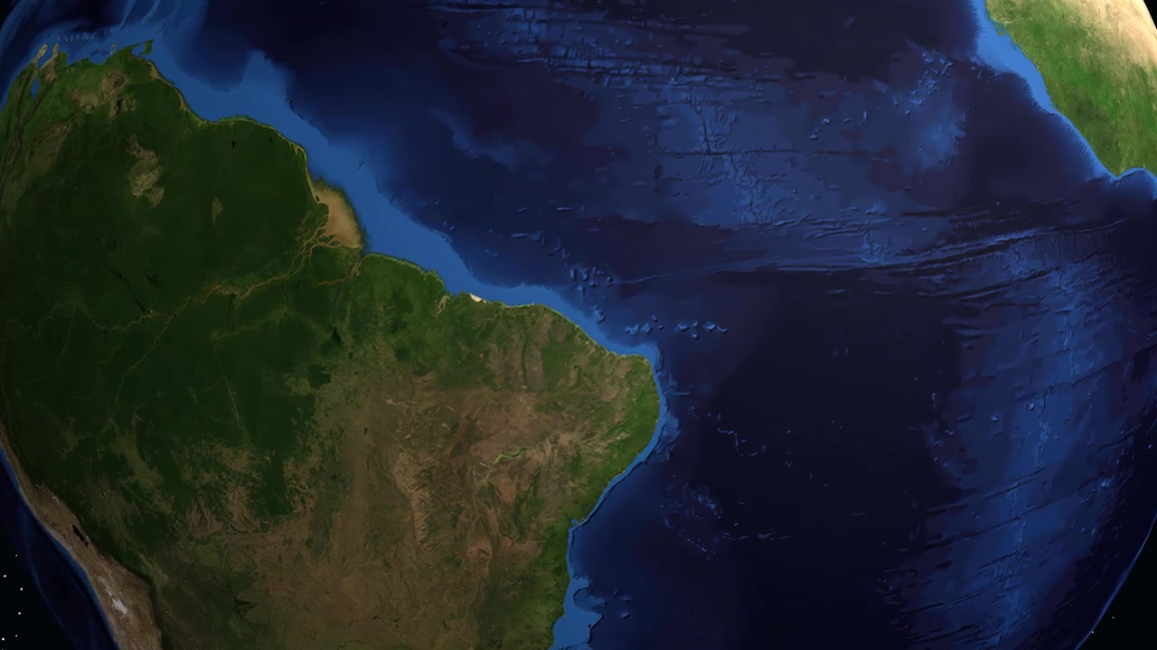 Un'animazione digitale zooma dallo spazio su Fortaleza, Brasile, con testo e indicatori di coordinate.