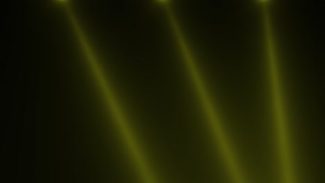 animation motion yellow glowing spotlight beams on dark background in stage 1