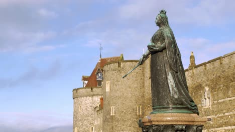 queen victoria statue outside windsor castle great britain on bright early morning