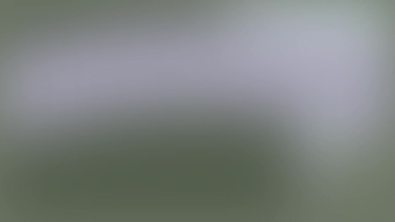 Abstract Blurred Background with Soft Grey and Green Tones