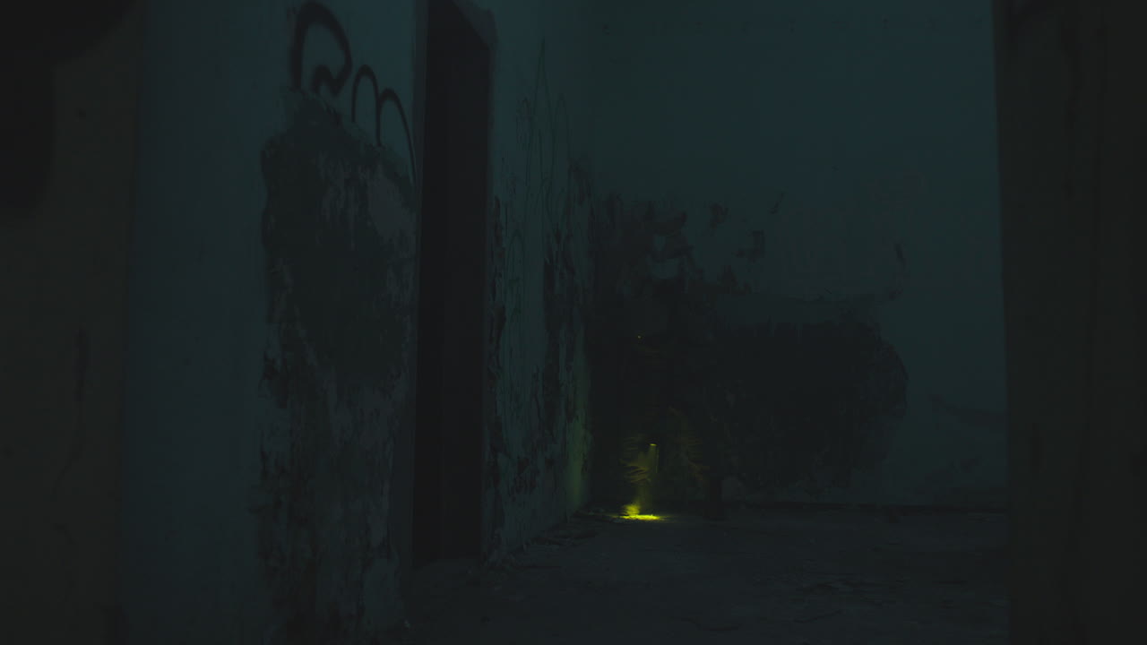 A wounded soldier in the abandoned military complex during the recon mission