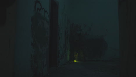 a wounded soldier in the abandoned military complex during the recon mission