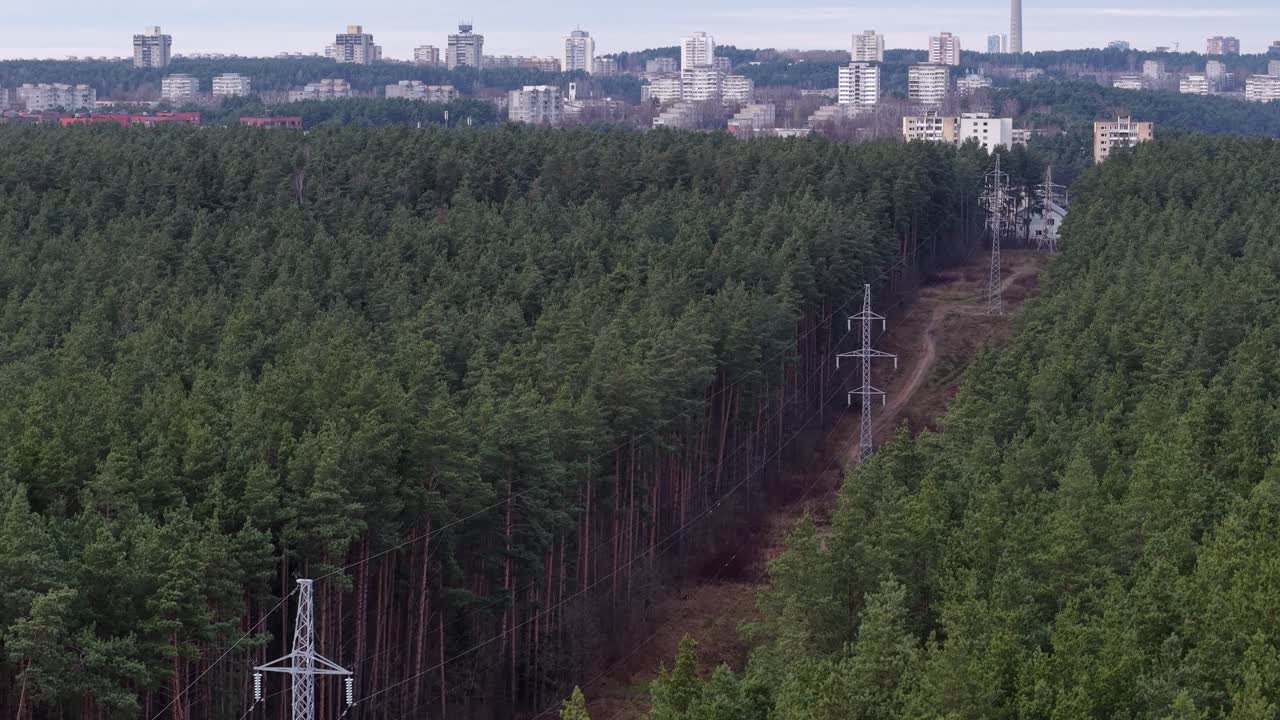 High power lines transferring electricity to Vilnius city, aerial view