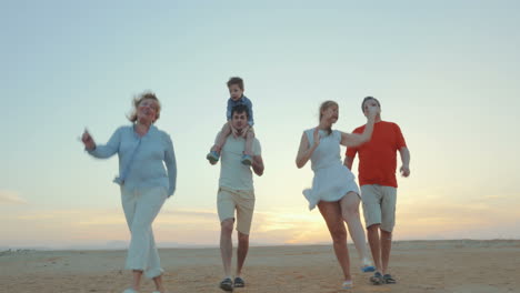 enjoable family walk on the beach