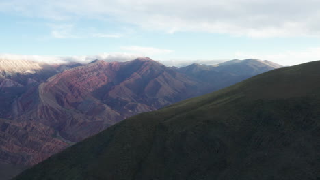 Serranias-el-Hornocal,-Cerro-de-14-Colores,-Argentina,-wide-aerial-shot-pan-left