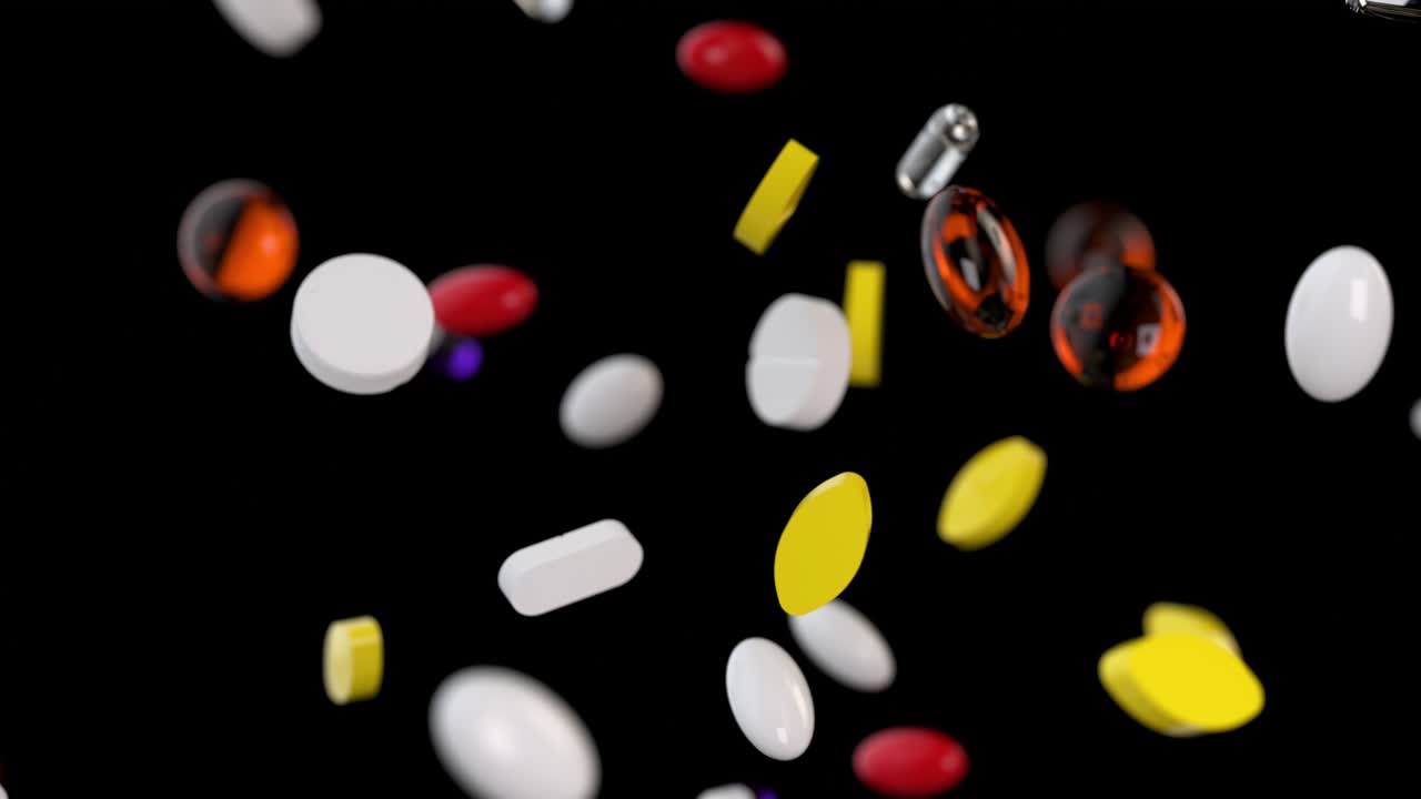 pastillas y cápsulas que caen