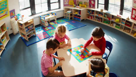 children's joyful puzzle play and celebration in a bright classroom