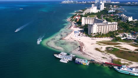 Tropical-Blue-Ocean-With-White-Sand-Beach-And-Resorts-On-Playa-Delfines,-Cancun-Mexico,-4K-Drone-Flyover