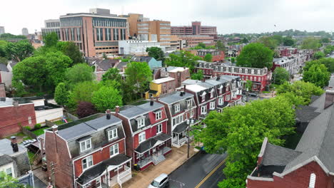 Wet-houses-in-city-with-hospital-in-background