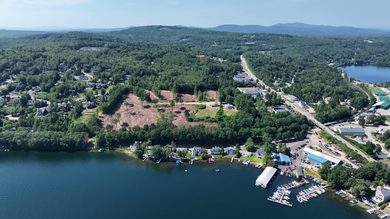 Drone view of the New Hampshire town of Meredith on Lake Winnipesaukee during a sunny day