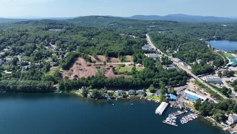 drone view of the new hampshire town of meredith on lake winnipesaukee during a sunny day