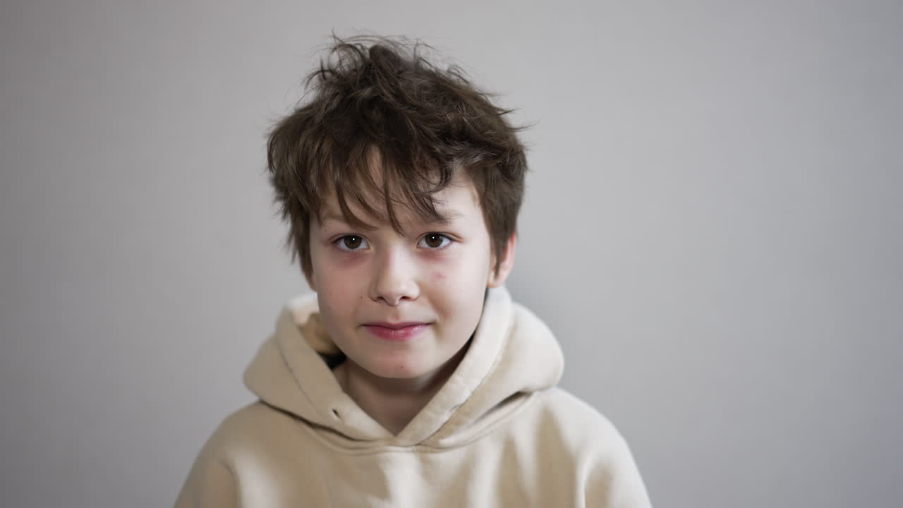 Boy Covering His Eyes