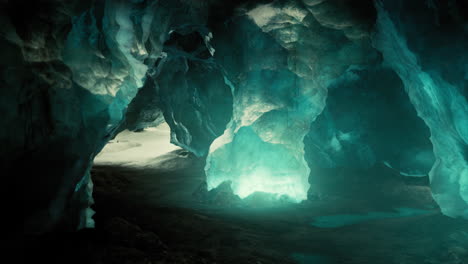 blue ice cave covered with snow and flooded with light