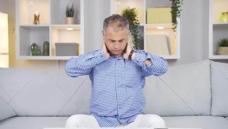 man with neck pain.