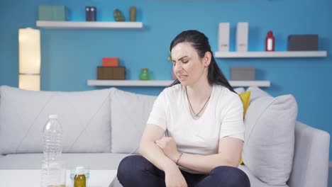 la mujer que se siente físicamente débil.