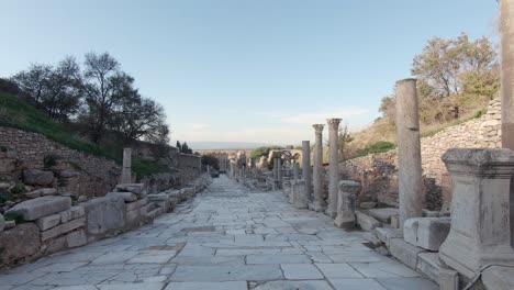 point of view shot, walking down hill on curetes street of ephesus toward the library of celsus