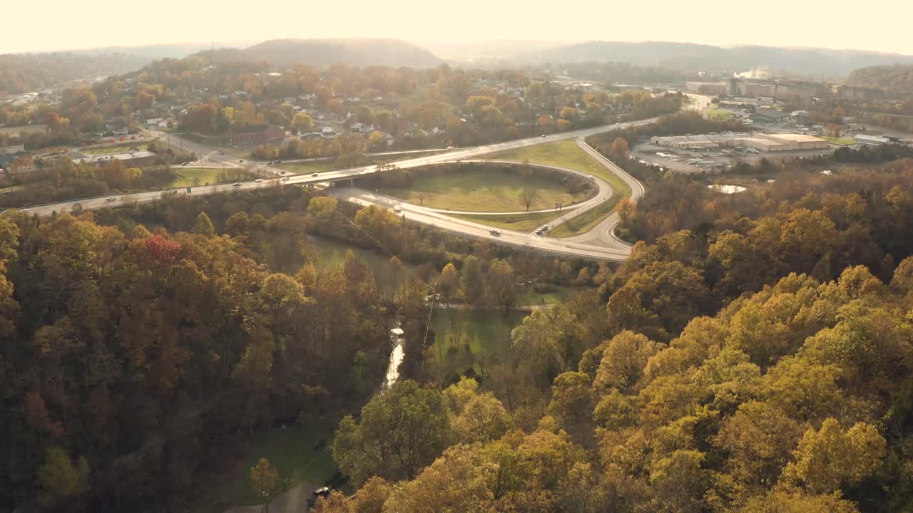 Aerial View of Autumnal Landscape with Highway Interchange