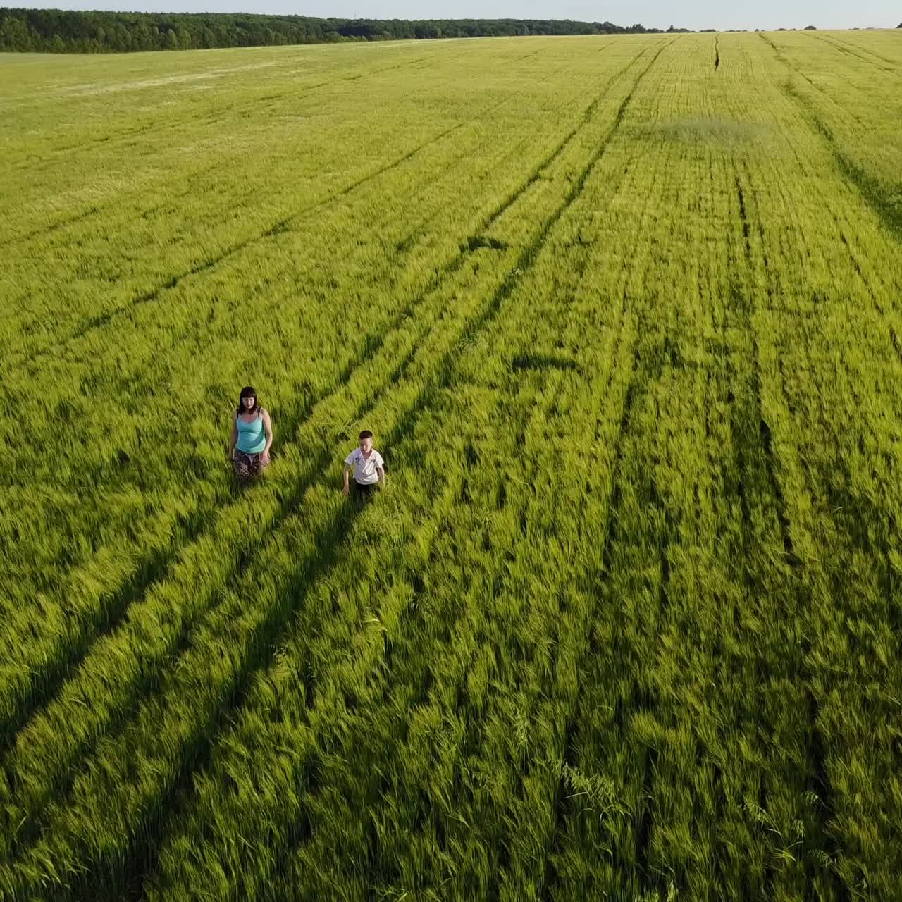 Mother And Son In Field