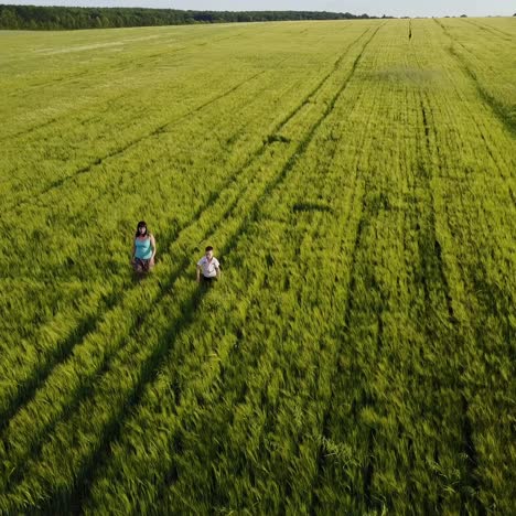 mother and son in field