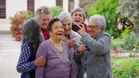 group of seniors taking a selfie