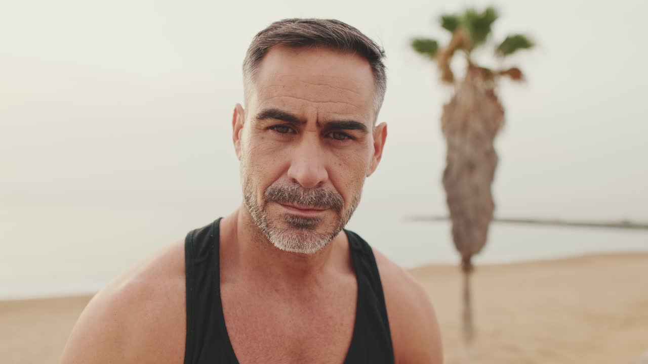Portrait of a middle-aged man at the beach