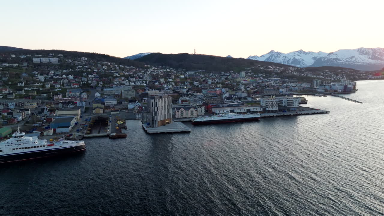 Aerial View of Cityscape with Mountains and Waterfront