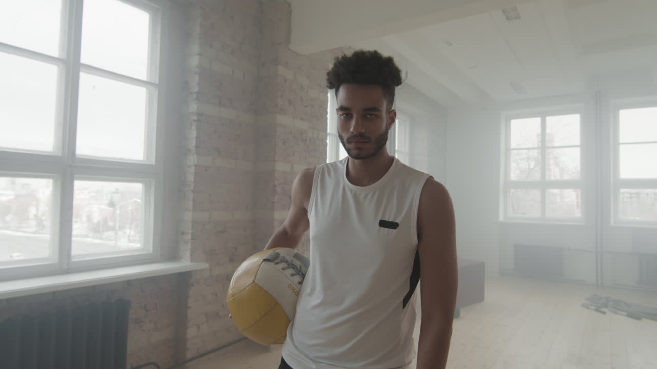 African American Sportsman With Medicine Ball