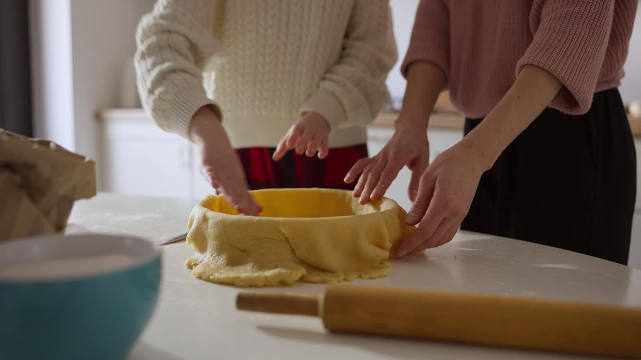 Couple Making Pie Together