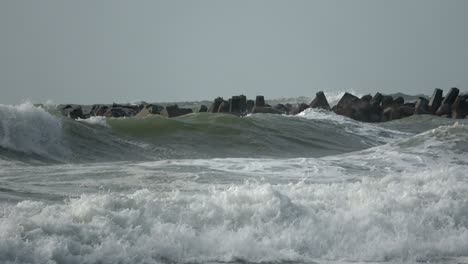 dyke protection with concrete groins, breakers, north sea, denmark, 4k